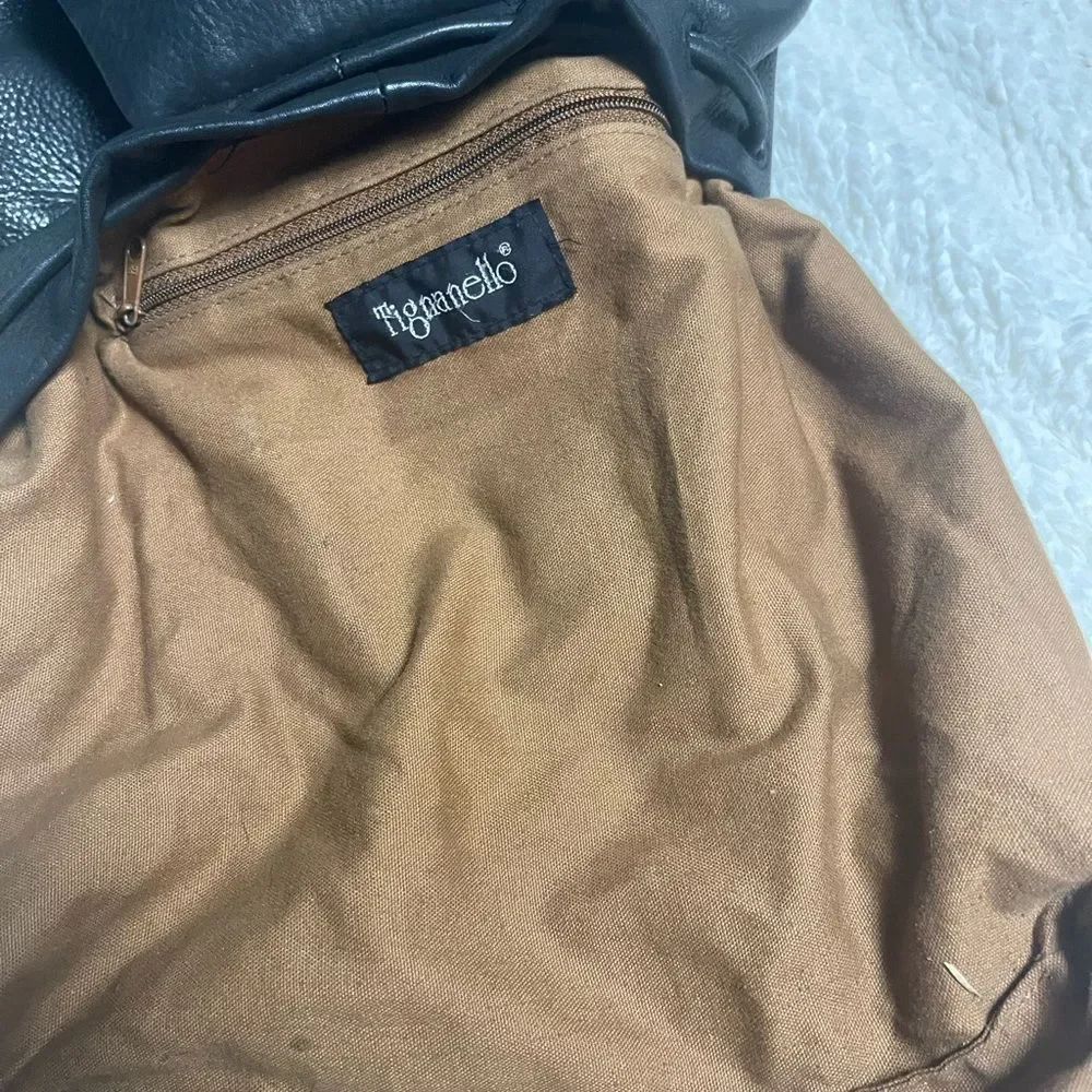 Tignanello Leather Black small Backpack string straps closure.